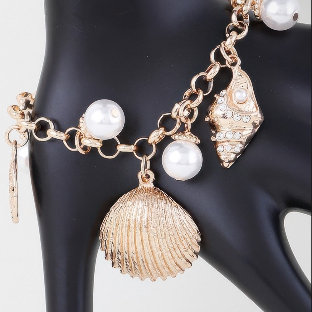 Bejeweled under the sea Gold and Pearl Charm Bracelet